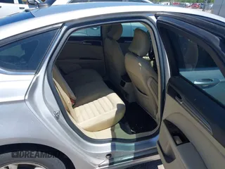 2015 Ford Fusion SE with VIN 3FA6P0H70FR229316, listed as a IAAI auction lot 42081286 with 185,294 mi miles and . Bid and sale history available at DreamBid. Image 8.