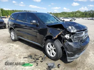 2012 Dodge Durango Crew with VIN 1C4RDHDG3CC265631, listed as a Copart auction lot 53474095 with 187,745 mi miles and Salvage Title. Bid and sale history available at DreamBid. Image 4.