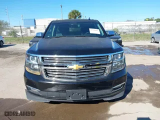 2017 Chevrolet Suburban Premier with VIN 1GNSKJKC0HR114398, listed as a IAAI auction lot 41745611 with 211,906 mi miles. Bid and sale history available at carsss.com. Image 12.