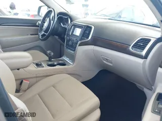 2014 Jeep Grand Cherokee Laredo with VIN 1C4RJFAG7EC380544, listed as a IAAI auction lot 42021130 with 166,589 mi miles. Bid and sale history available at carsss.com. Image 5.