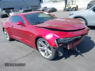 2021 Chevrolet Camaro 1LT with VIN 1G1FB1RX9M0107010, listed as a IAAI auction lot 42629591 with 65,450 mi miles and . Bid and sale history available at DreamBid. Image 1.