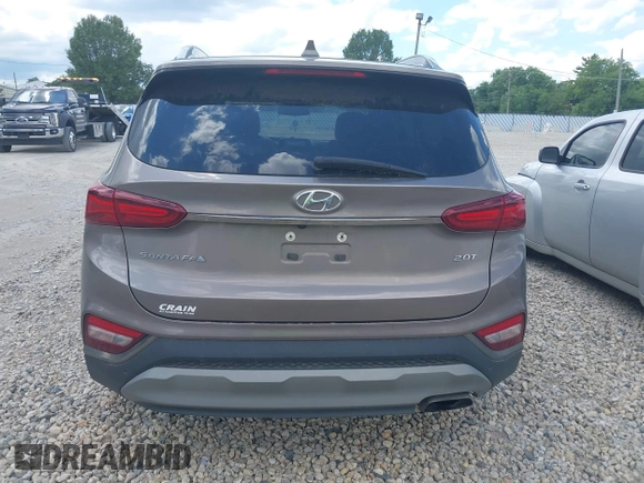 2020 Hyundai Santa Fe Limited with VIN 5NMS53AA5LH191809, listed as a IAAI auction lot 39804008 with 115,775 mi miles and . Bid and sale history available at DreamBid. Image 16.