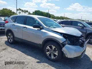 2019 Honda CR-V LX with VIN 2HKRW5H31KH411771, listed as a IAAI auction lot 42060193 with 175,036 mi miles and . Bid and sale history available at DreamBid. Image 1.