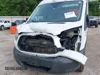 2015 Ford Transit Cargo with VIN 1FTNR1CM2FKB29029, listed as a IAAI auction lot 42286089 with 130,845 mi miles and . Bid and sale history available at DreamBid. Image 6.