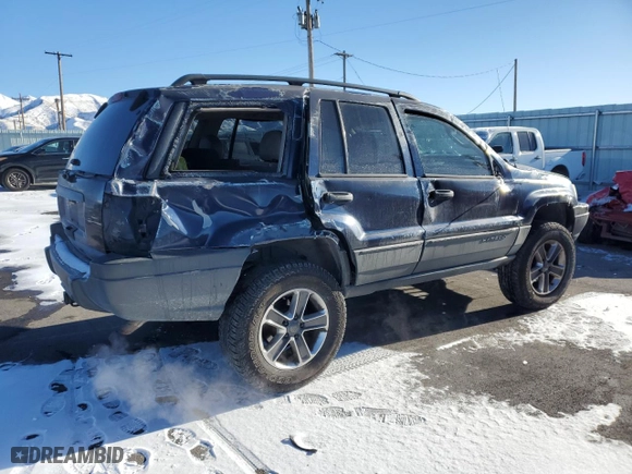 2004 Jeep Grand Cherokee Laredo with VIN 1J4GW48S44C325808, listed as a Copart auction lot 89351575 with 312,011 mi miles and Salvage Title. Bid and sale history available at carsss.com. Image 3.