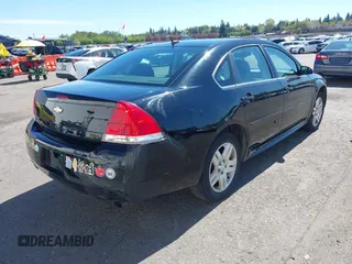 2014 Chevrolet Impala LT with VIN 2G1WB5E30E1166401, listed as a IAAI auction lot 42071504 with 158,813 mi miles and . Bid and sale history available at DreamBid. Image 4.