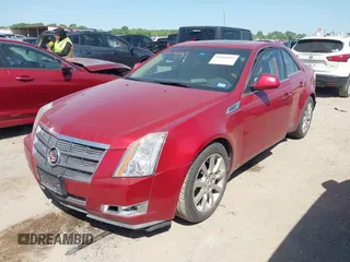 2008 Cadillac CTS RWD w/1SB with VIN 1G6DV57V980213836, listed as a IAAI auction lot 42006005 with 124,596 mi miles. Bid and sale history available at carsss.com. Image 2.
