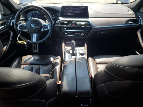 2018 BMW 5 Series 540i with VIN WBAJE5C51JWA94673, listed as a Copart auction lot 59807825 with 77,051 mi miles and Salvage title. Bid and sale history available at DreamBid. Image 8.