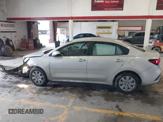 2022 Kia Rio S with VIN 3KPA24AD2NE473517, listed as a IAAI auction lot 41704769 with 52,810 mi miles. Bid and sale history available at carsss.com. Image 14.