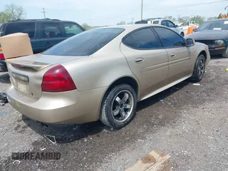 2004 Pontiac Grand Prix GTP with VIN 2G2WR524941282246, listed as a IAAI auction lot 42068954 with 292,925 mi miles. Bid and sale history available at carsss.com. Image 4.