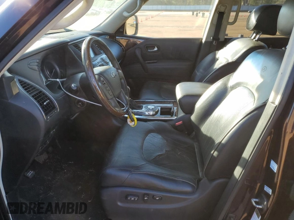 2012 Infiniti QX56 8-passenger with VIN JN8AZ2ND0C9716421, listed as a Copart auction lot 80701904 with 124,124 mi miles and Clean Title. Bid and sale history available at carsss.com. Image 7.
