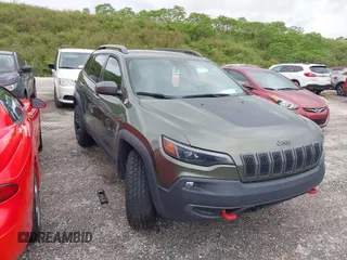 2021 Jeep Cherokee Trailhawk z VIN 1C4PJMBX5MD210234, wystawiony jako IAAI lot #40526567 z przebiegiem Nie podano mil oraz . Historia ofert i sprzedaży dostępna na DreamBid. Obrazek 1.