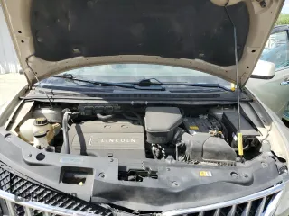 2011 Lincoln MKX z VIN 2LMDJ6JK9BBJ12766, wystawiony jako Copart lot #57494185 z przebiegiem 101 379 mil mil oraz Szkoda całkowita • Salvage title. Historia ofert i sprzedaży dostępna na DreamBid. Obrazek 12.
