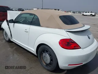 2015 Volkswagen Beetle 1.8T w/Tech with VIN 3VW517AT4FM812294, listed as a IAAI auction lot 41753967 with 59,857 mi miles and . Bid and sale history available at DreamBid. Image 3.