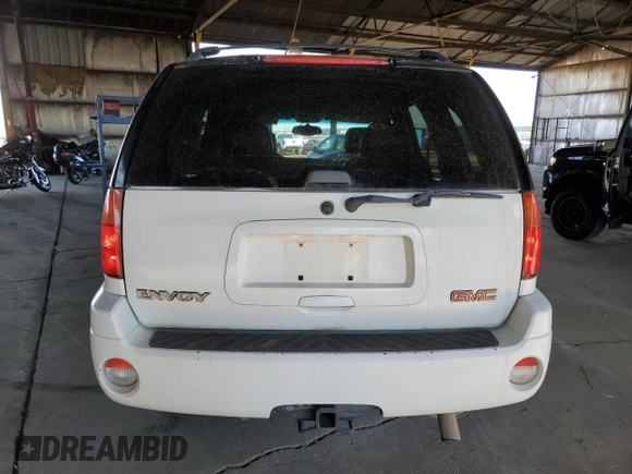 2002 GMC Envoy SLT with VIN 1GKDT13S922128924, listed as a Copart auction lot 46131035 with 162,499 mi miles and Salvage Title. Bid and sale history available at carsss.com. Image 6.