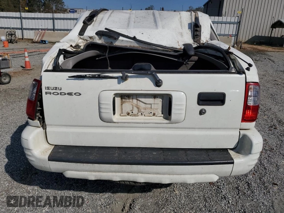 2004 Isuzu Rodeo S with VIN 4S2DM58W144310706, listed as a Copart auction lot 74980644 with 155,262 mi miles and Salvage Title. Bid and sale history available at DreamBid. Image 6.