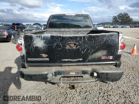 1998 GMC Sonoma z VIN 1GTCS144XW8525300, wystawiony jako Copart lot #85439034 z przebiegiem 250 144 mil mil oraz Szkody całkowita. Historia ofert i sprzedaży dostępna na DreamBid. Obrazek 6.