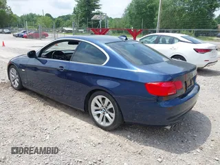 2011 BMW 3 Series 328i with VIN WBAKE3C52BE557501, listed as a IAAI auction lot 42138050 with 209,575 mi miles and . Bid and sale history available at carsss.com. Image 3.