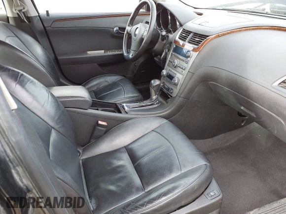 2012 Chevrolet Malibu LTZ with VIN 1G1ZG5E76CF145804, listed as a IAAI auction lot 40997646 with 207,247 mi miles and . Bid and sale history available at DreamBid. Image 5.