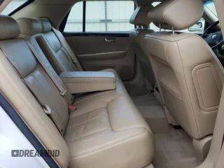 2006 Cadillac DTS 1SD z VIN 1G6KD57Y86U146074, wystawiony jako Copart lot #52917235 z przebiegiem 133 956 mil mil oraz Tytuł czysty. Historia ofert i sprzedaży dostępna na DreamBid. Obrazek 10.