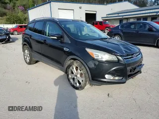 2014 Ford Escape Titanium with VIN 1FMCU9J94EUE57909, listed as a Copart auction lot 51955785 with 154,819 mi miles and Salvage Title. Bid and sale history available at DreamBid. Image 11.