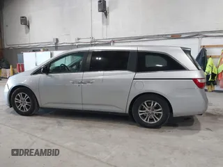 2012 Honda Odyssey EX z VIN 5FNRL5H47CB045705, wystawiony jako IAAI lot #42384430 z przebiegiem 157 598 mil mil oraz . Historia ofert i sprzedaży dostępna na DreamBid. Obrazek 14.