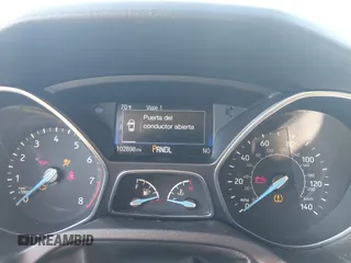 2015 Ford Focus SE with VIN 1FADP3F29FL350473, listed as a IAAI auction lot 41032182 with 102,898 mi miles. Bid and sale history available at carsss.com. Image 7.