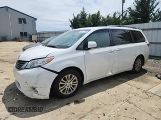 2011 Toyota Sienna XLE AAS with VIN 5TDYK3DC1BS017540, listed as a Copart auction lot 65177255 with 164,604 mi miles and Salvage title. Bid and sale history available at DreamBid. Image 1.