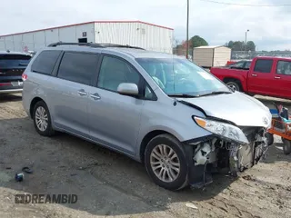 2013 Toyota Sienna XLE AAS with VIN 5TDYK3DC1DS392332, listed as a IAAI auction lot 40968544 with 129,081 mi miles and . Bid and sale history available at carsss.com. Image 1.