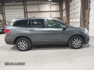 2019 Honda Pilot EX-L with VIN 5FNYF6H51KB099825, listed as a IAAI auction lot 42421688 with 51,370 mi miles and . Bid and sale history available at DreamBid. Image 13.
