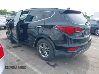 2017 Hyundai Santa Fe 2.4L with VIN 5NMZUDLB0HH037142, listed as a IAAI auction lot 42323880 with 87,396 mi miles and . Bid and sale history available at DreamBid. Image 3.