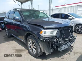 2014 Dodge Durango Limited z VIN 1C4RDHDG6EC975934, wystawiony jako IAAI lot #42416833 z przebiegiem 158 266 mil mil oraz . Historia ofert i sprzedaży dostępna na DreamBid. Obrazek 1.