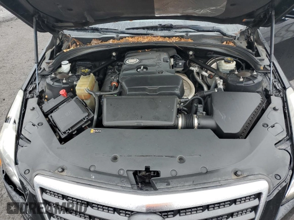 2013 Cadillac ATS z VIN 1G6AA5RA3D0163096, wystawiony jako Copart lot #51868075 z przebiegiem 93 074 mil mil oraz Szkoda całkowita • Salvage title. Historia ofert i sprzedaży dostępna na DreamBid. Obrazek 12.