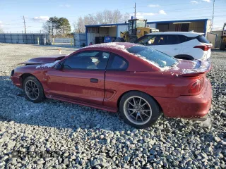 1996 Ford Mustang GT z VIN 1FALP42X0TF168223, wystawiony jako Copart lot #46351085 z przebiegiem 121 657 mil mil oraz Szkoda całkowita • Salvage title. Historia ofert i sprzedaży dostępna na DreamBid. Obrazek 2.
