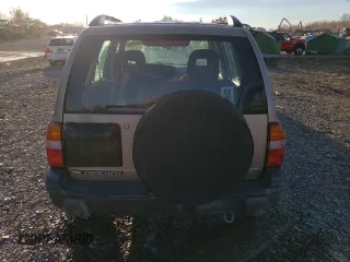 2002 Chevrolet Tracker ZR2 with VIN 2CNBJ734826902012, listed as a Copart auction lot 79226854 with 80,460 mi miles and Salvage title. Bid and sale history available at DreamBid. Image 6.