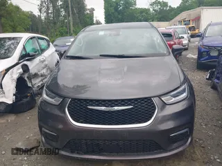 2023 Chrysler Pacifica Hybrid Touring L with VIN 2C4RC1L72PR540902, listed as a IAAI auction lot 42151047 with Not Provided miles and . Bid and sale history available at DreamBid. Image 11.