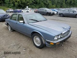 1989 Jaguar XJ with VIN SAJHY1540KC578115, listed as a Copart auction lot 69142274 with Not Provided miles and Clean Title. Bid and sale history available at DreamBid. Image 4.