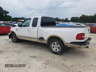 1999 Ford F-150 z VIN 1FTRX07W6XKA48100, wystawiony jako Copart lot #73209844 z przebiegiem Nie podano mil oraz Szkoda całkowita • Salvage title. Historia ofert i sprzedaży dostępna na DreamBid. Obrazek 2.