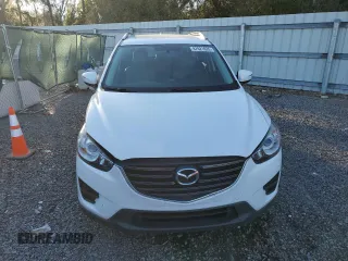 2016 Mazda CX-5 Sport with VIN JM3KE2BY3G0877107, listed as a Copart auction lot 87621635 with 83,093 mi miles and Salvage Title. Bid and sale history available at carsss.com. Image 5.