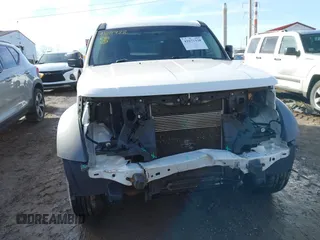 2008 Dodge Nitro SXT with VIN 1D8GU28K18W113714, listed as a IAAI auction lot 41671938 with 118,629 mi miles. Bid and sale history available at carsss.com. Image 13.