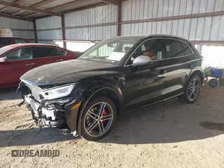 2018 Audi SQ5 Premium Plus z VIN WA1A4AFYXJ2063277, wystawiony jako IAAI lot #41657799 z przebiegiem 86 111 mil mil oraz . Historia ofert i sprzedaży dostępna na DreamBid. Obrazek 2.