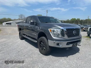2016 Nissan Titan XD Platinum Reserve with VIN 1N6BA1F2XGN516798, listed as a Copart auction lot 53584635 with 104,737 mi miles and Clean Title. Bid and sale history available at carsss.com. Image 1.