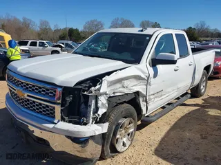 2015 Chevrolet Silverado 1500 LT with VIN 1GCVKREH4FZ298348, listed as a IAAI auction lot 41766562 with 102,749 mi miles. Bid and sale history available at carsss.com. Image 2.