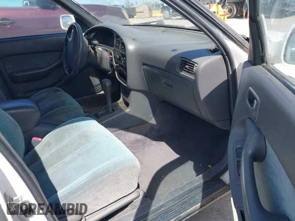 1993 Toyota Camry LE z VIN JT2SK12E0P0143650, wystawiony jako IAAI lot #42345181 z przebiegiem 264 350 mil mil oraz . Historia ofert i sprzedaży dostępna na DreamBid. Obrazek 5.
