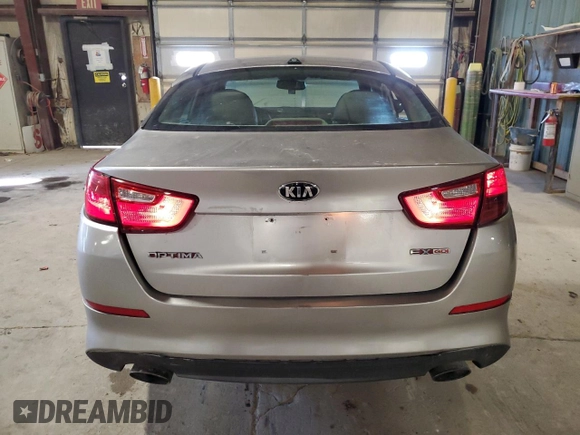 2014 Kia Optima LX z VIN 5XXGM4A73EG330811, wystawiony jako Copart lot #46655255 z przebiegiem 125 783 mil mil oraz Szkoda całkowita • Salvage title. Historia ofert i sprzedaży dostępna na DreamBid. Obrazek 6.