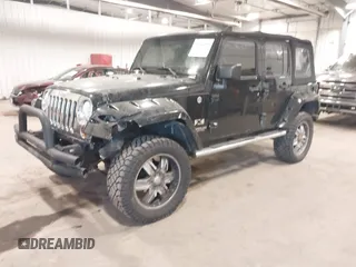 2008 Jeep Wrangler Unlimited X with VIN 1J4GA391X8L558984, listed as a IAAI auction lot 41016498 with 123,308 mi miles. Bid and sale history available at carsss.com. Image 17.