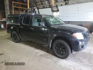 2021 Nissan Frontier SV with VIN 1N6ED0EB1MN713385, listed as a Copart auction lot 61049085 with 93,196 mi miles and Salvage title. Bid and sale history available at DreamBid. Image 4.