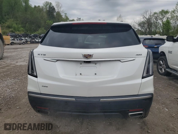 2023 Cadillac XT5 AWD Sport with VIN 1GYKNGRS4PZ176086, listed as a Copart auction lot 53955535 with 15,709 mi miles and Salvage title. Bid and sale history available at DreamBid. Image 6.