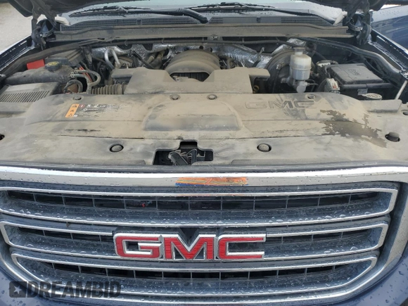 2017 GMC Yukon SLT with VIN 1GKS1BKC5HR295827, listed as a Copart auction lot 48189565 with 106,867 mi miles and Salvage Title. Bid and sale history available at carsss.com. Image 12.