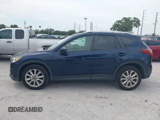 2014 Mazda CX-5 Grand Touring with VIN JM3KE2DY8E0425258, listed as a IAAI auction lot 42179452 with 132,137 mi miles. Bid and sale history available at carsss.com. Image 14.